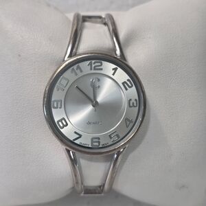 Charming Charlie Silver Bangle Quartz Watch with Numeric Dial
